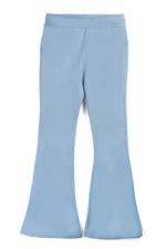 Light blue flared yoga pants on a white background