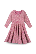 A pink long-sleeve dress with a dense floral and paisley pattern, featuring a round neckline and a flared skirt, shown against a plain white background.