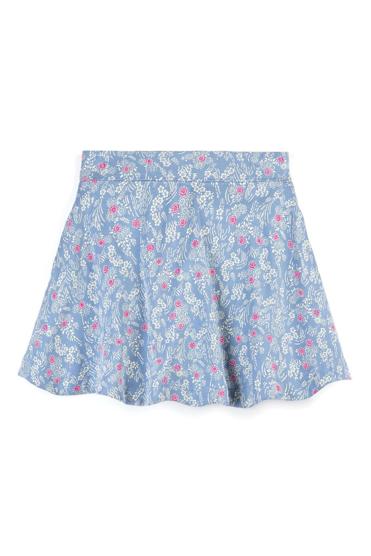 A light blue skort with a delicate white floral and leaf print, accented with small pink flowers, shown flat against a white background.
