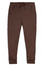 A pair of dark brown jogger sweatpants with an elastic drawstring waist, side pockets, and ribbed ankle cuffs, shown flat on a white background. 