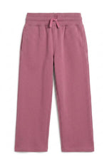 A pair of dusty rose pink sweatpants with an elastic waistband and matching drawstring, shown flat on a white background. 