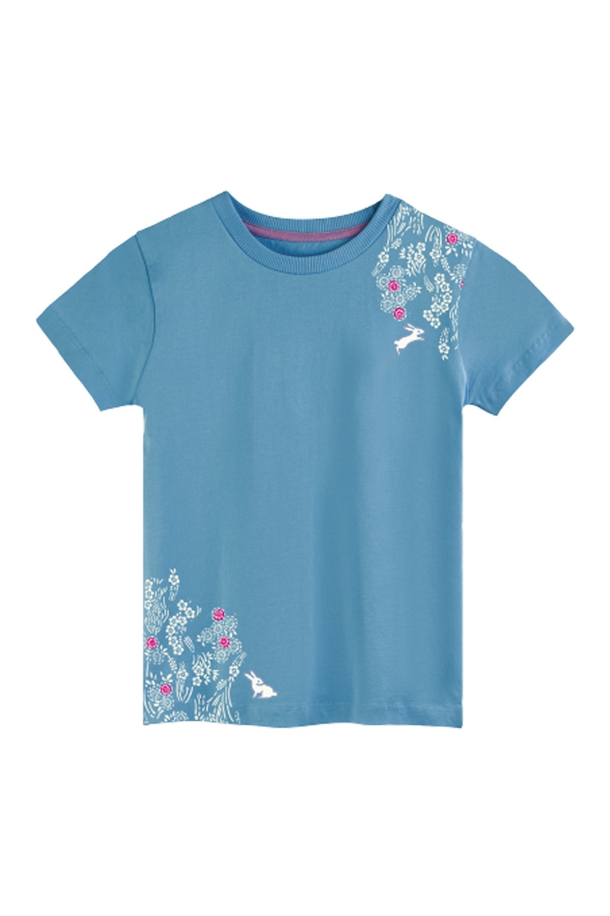 Blue tee shirt with a pink and white print featuring flowers and bunnies on a white background. 