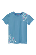 Blue tee shirt with a pink and white print featuring flowers and bunnies on a white background. 