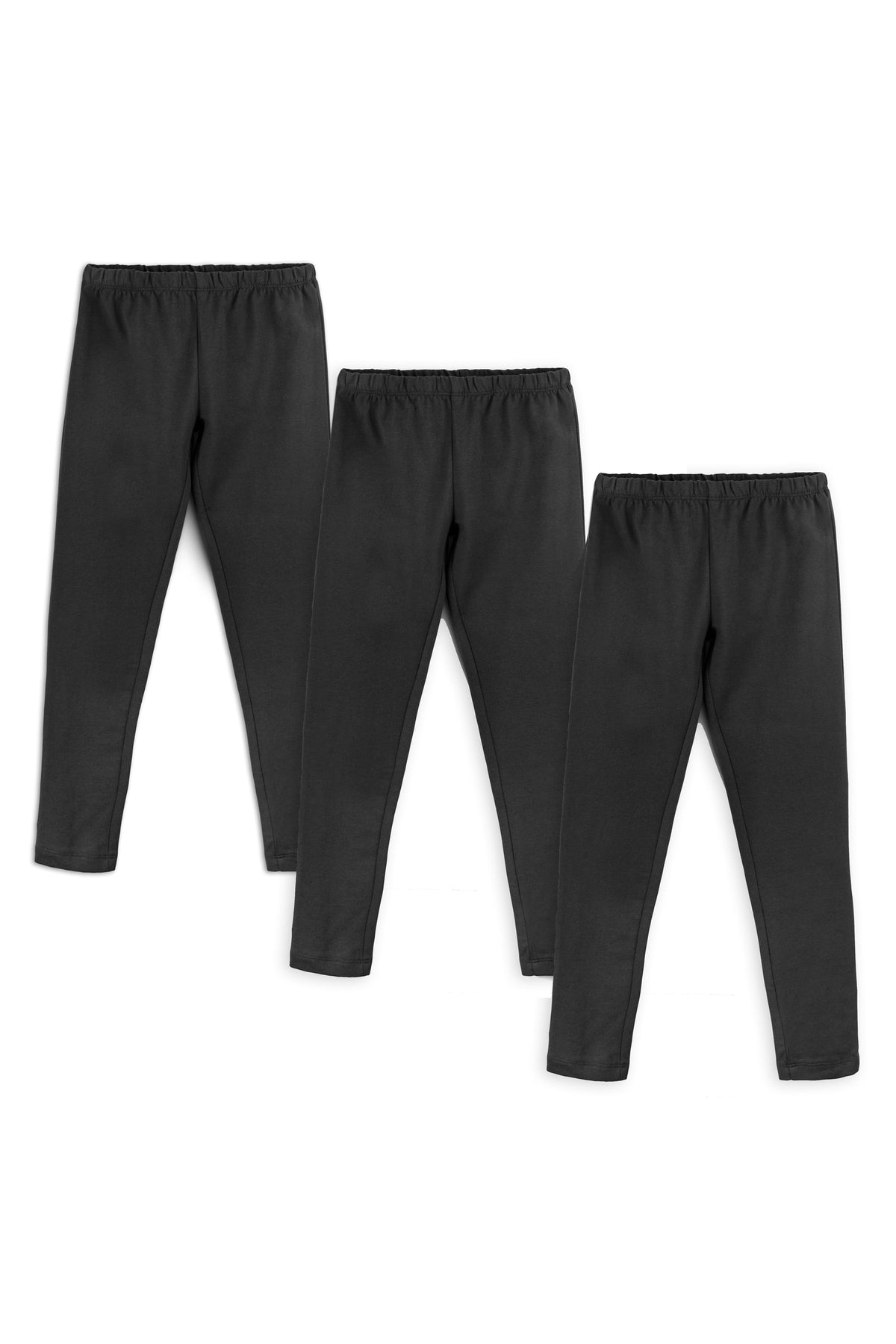 Three black kids' organic cotton leggings laid out on a white background.