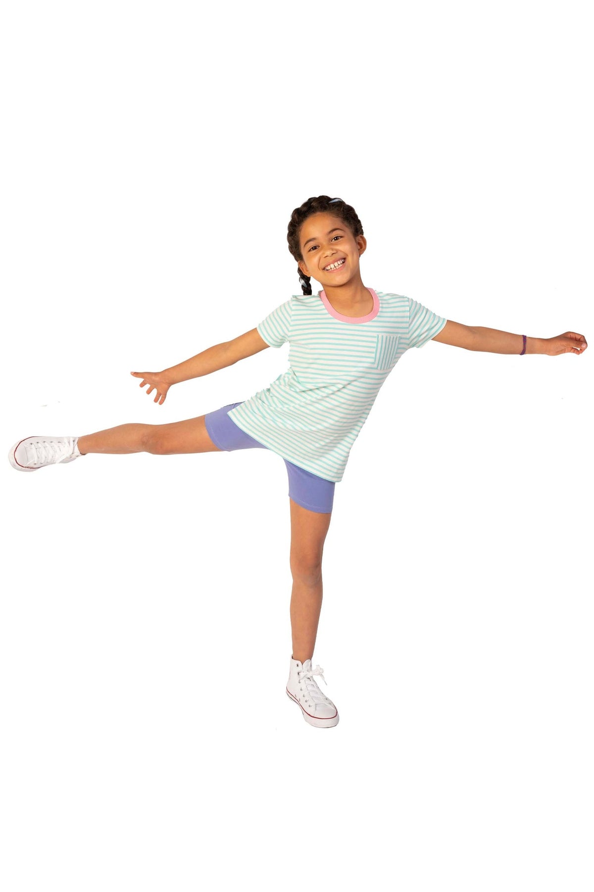 girls wearing a blue striped tee and purple bike shorts on a white background.